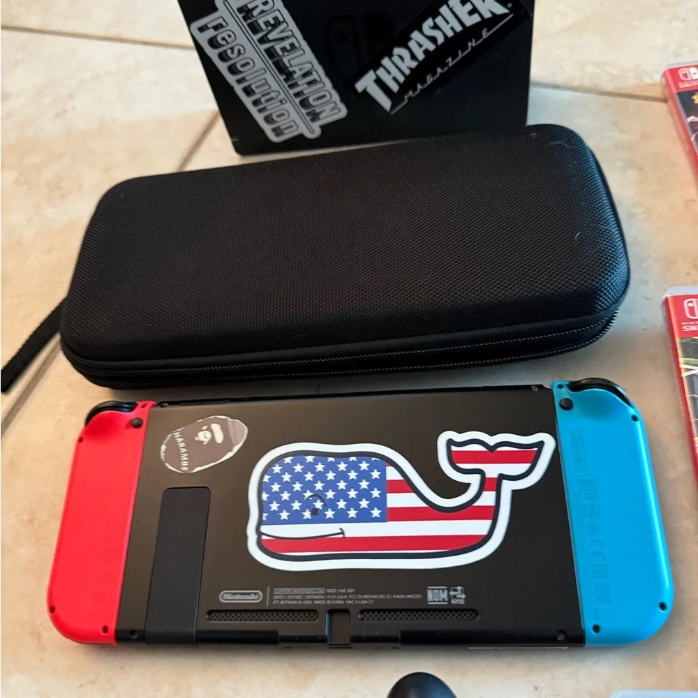 Complete Nintendo Switch system with Red and Blue Joy-Con Controllers